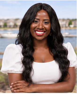 Tola Adebiyi smiling by the lake in Rockwall, Texas